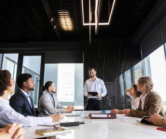 Image of people gathered in a meeting